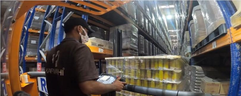 Warehouse aisle with a forklift